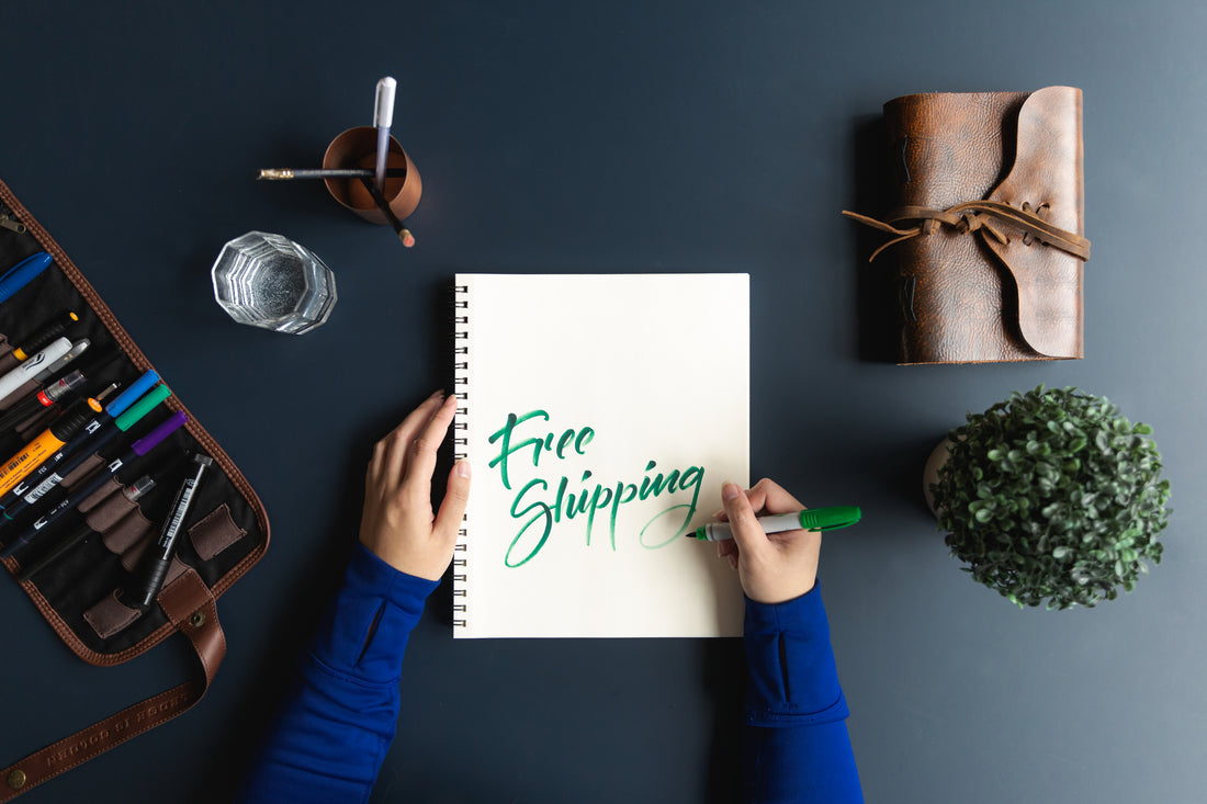 Free shipping written in a notebook