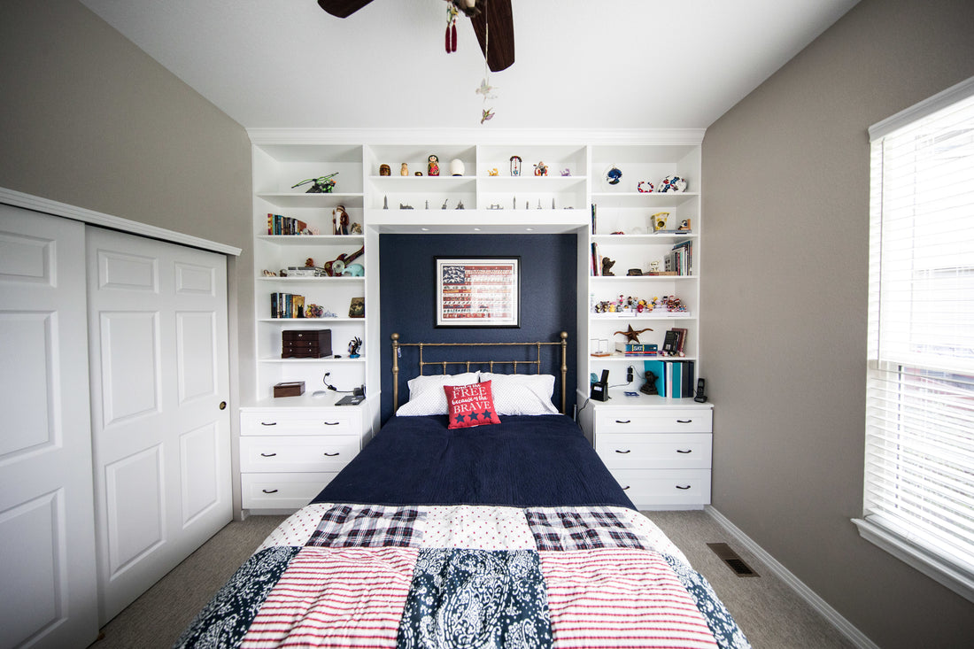 Small painted bedroom with shelving